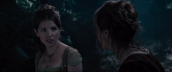 Movie still from “Into the Woods” (2014), directed by Rob Marshall – Two women are talking in a forest; Close Up shot, Over the shoulder angle