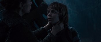 Movie still from “Into the Woods” (2014), directed by Rob Marshall – A young boy with long brown hair is looking up at the sky; Close Up shot, Over the shoulder angle