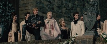 Movie still from “Into the Woods” (2014), directed by Rob Marshall – A group of people dressed up in costumes; Wide shot, Low angle