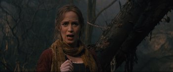 Movie still from “Into the Woods” (2014), directed by Rob Marshall – A woman in a brown dress and a brown scarf; Close Up shot, Low angle