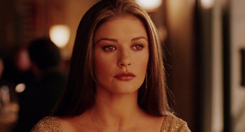 Movie still from “Intolerable Cruelty” (2003), directed by Joel Coen – A person with long hair; Close Up shot, Over the shoulder angle
