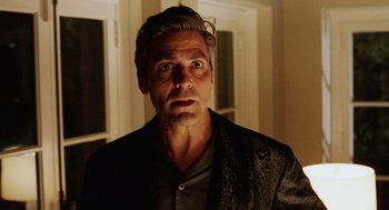 Movie still from “Intolerable Cruelty” (2003), directed by Joel Coen – A person wearing a jacket; Close Up shot, Low angle