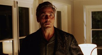 Movie still from “Intolerable Cruelty” (2003), directed by Joel Coen – A person wearing a robe; Close Up shot, Low angle