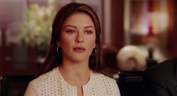 Movie still from “Intolerable Cruelty” (2003), directed by Joel Coen – A person wearing a white shirt; Close Up shot, Over the shoulder angle