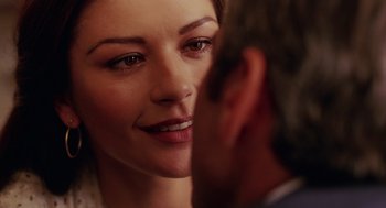 Movie still from “Intolerable Cruelty” (2003), directed by Joel Coen – A woman's face and a man's face; Close Up shot, Over the shoulder angle