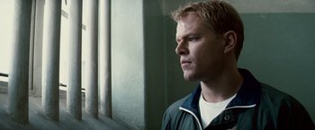 Movie still from “Invictus” (2009), directed by Clint Eastwood – A person standing near a window; Close Up shot, Low angle