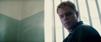 Movie still from “Invictus” (2009), directed by Clint Eastwood – A person with short blond hair; Close Up shot, Low angle