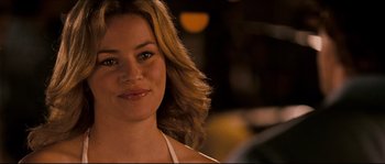 Movie still from “Invincible” (2006), directed by Ericson Core – A person with long hair; Close Up shot, Over the shoulder angle