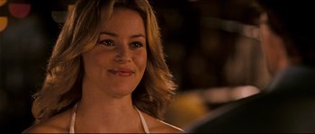 Movie still from “Invincible” (2006), directed by Ericson Core – A woman's face in a white top; Close Up shot, Over the shoulder angle