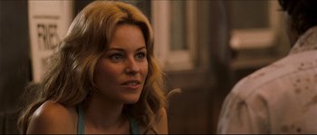 Movie still from “Invincible” (2006), directed by Ericson Core – A person with blonde hair; Close Up shot, Over the shoulder angle