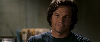 Movie still from “Invincible” (2006), directed by Ericson Core – A person wearing a shirt; Close Up shot, Over the shoulder angle