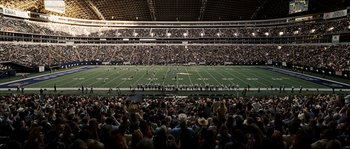 Movie still from “Invincible” (2006), directed by Ericson Core – A large crowd of people watching a football game; Extreme Wide shot, High angle