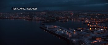 Movie still from “Jason Bourne” (2016), directed by Paul Greengrass – An aerial view of an island in the middle of the night; Extreme Wide shot, High angle