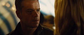 Movie still from “Jason Bourne” (2016), directed by Paul Greengrass – A person wearing a leather jacket; Close Up shot, Over the shoulder angle