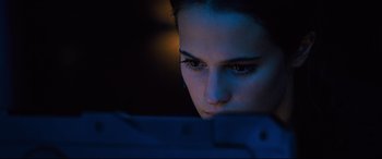 Movie still from “Jason Bourne” (2016), directed by Paul Greengrass – A person using a computer; Close Up shot, Low angle
