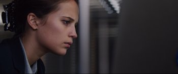 Movie still from “Jason Bourne” (2016), directed by Paul Greengrass – A person's face in a room; Close Up shot, Low angle