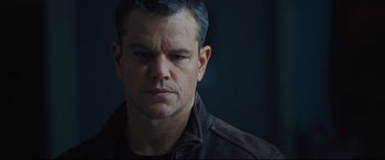 Movie still from “Jason Bourne” (2016), directed by Paul Greengrass – A person wearing a jacket; Close Up shot, Low angle