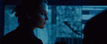 Movie still from “Jason Bourne” (2016), directed by Paul Greengrass – A person looking at something; Close Up shot, Over the shoulder angle