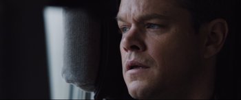 Movie still from “Jason Bourne” (2016), directed by Paul Greengrass – A man's face as he listens intently; Close Up shot, Low angle
