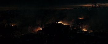 Movie still from “J. Edgar” (2011), directed by Clint Eastwood – A fire is burning in a city at night; Extreme Wide shot, High angle