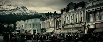 Movie still from “J. Edgar” (2011), directed by Clint Eastwood – A crowd of people walking down a street; Extreme Wide shot, High angle
