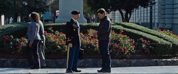 Movie still from “Jack Reacher: Never Go Back” (2016), directed by Edward Zwick – A man in a military uniform talking to another man in a uniform; Wide shot, Over the shoulder angle