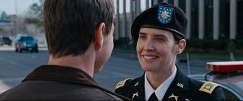 Movie still from “Jack Reacher: Never Go Back” (2016), directed by Edward Zwick – A woman in a military uniform talking to a man; Close Up shot, Over the shoulder angle