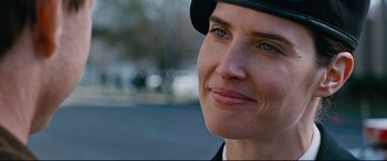 Movie still from “Jack Reacher: Never Go Back” (2016), directed by Edward Zwick – A person wearing a hat; Close Up shot, Over the shoulder angle