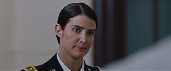 Movie still from “Jack Reacher: Never Go Back” (2016), directed by Edward Zwick – A person wearing a military uniform; Close Up shot, Over the shoulder angle