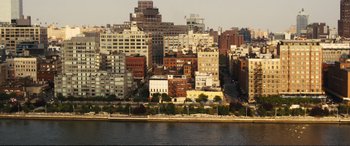 Movie still from “Jack Ryan: Shadow Recruit” (2014), directed by Kenneth Branagh – A view of a large city from across the river; Extreme Wide shot, High angle