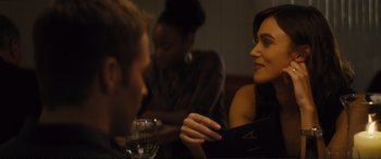 Movie still from “Jack Ryan: Shadow Recruit” (2014), directed by Kenneth Branagh – A man and a woman sitting at a table with a glass of wine; Close Up shot, Over the shoulder angle