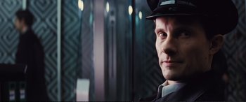 Movie still from “Jack Ryan: Shadow Recruit” (2014), directed by Kenneth Branagh – A person wearing a hat; Close Up shot, Low angle