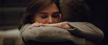 Movie still from “Jack Ryan: Shadow Recruit” (2014), directed by Kenneth Branagh – A person hugging a blanket; Close Up shot, Over the shoulder angle