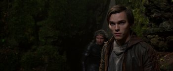 Movie still from “Jack the Giant Slayer” (2013), directed by Bryan Singer – A man in medieval garb is looking into the distance; Close Up shot, Over the shoulder angle