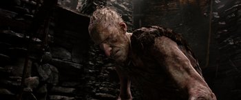 Movie still from “Jack the Giant Slayer” (2013), directed by Bryan Singer – A person with a face covered in dirt; Close Up shot, Low angle