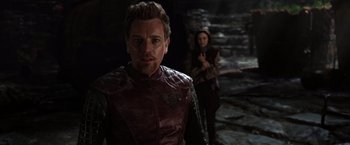 Movie still from “Jack the Giant Slayer” (2013), directed by Bryan Singer – A man and a woman are standing in the dark; Medium shot, Over the shoulder angle