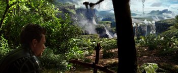Movie still from “Jack the Giant Slayer” (2013), directed by Bryan Singer – A view of a lush green forest with a waterfall; Extreme Wide shot, High angle