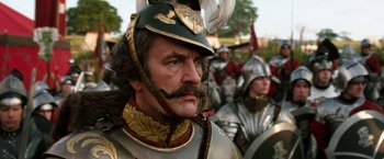 Movie still from “Jack the Giant Slayer” (2013), directed by Bryan Singer – A person wearing a helmet; Close Up shot, Low angle