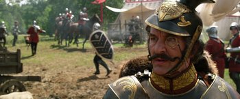 Movie still from “Jack the Giant Slayer” (2013), directed by Bryan Singer – A man in a suit of a medieval knight; Close Up shot, Over the shoulder angle