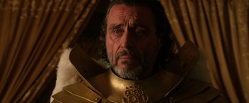 Movie still from “Jack the Giant Slayer” (2013), directed by Bryan Singer – A person wearing a costume; Close Up shot, Low angle