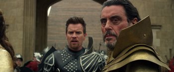 Movie still from “Jack the Giant Slayer” (2013), directed by Bryan Singer – Two men dressed in medieval armor and holding swords; Close Up shot, Over the shoulder angle