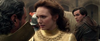 Movie still from “Jack the Giant Slayer” (2013), directed by Bryan Singer – A person wearing a necklace; Close Up shot, Over the shoulder angle