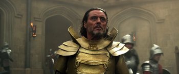 Movie still from “Jack the Giant Slayer” (2013), directed by Bryan Singer – A person wearing a suit of armor; Close Up shot, Low angle