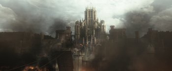 Movie still from “Jack the Giant Slayer” (2013), directed by Bryan Singer – An old castle with a castle like structure in the middle of it; Extreme Wide shot, Low angle