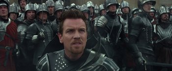 Movie still from “Jack the Giant Slayer” (2013), directed by Bryan Singer – A group of men in medieval armor standing next to each other; Close Up shot, Over the shoulder angle