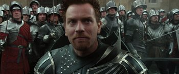 Movie still from “Jack the Giant Slayer” (2013), directed by Bryan Singer – A person wearing armor; Close Up shot, Over the shoulder angle