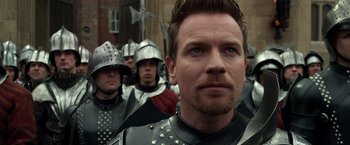 Movie still from “Jack the Giant Slayer” (2013), directed by Bryan Singer – A group of men in medieval garb standing next to each other; Close Up shot, Over the shoulder angle