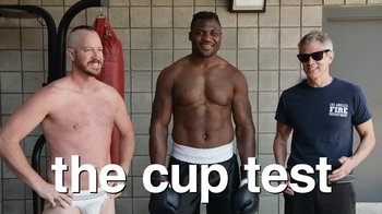 Movie still from “Jackass Forever” (2022), directed by Jeff Tremaine – Three men are posing for a picture in their underwear; Medium shot, Low angle