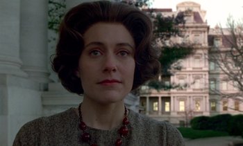 Movie still from “Jackie” (2016), directed by Pablo Larraín – A person wearing a necklace; Close Up shot, Low angle