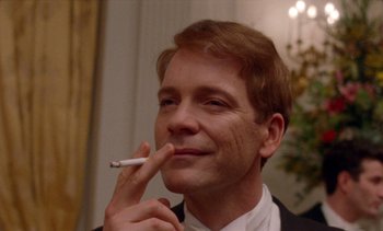 Movie still from “Jackie” (2016), directed by Pablo Larraín – A person smoking a cigarette; Close Up shot, Low angle